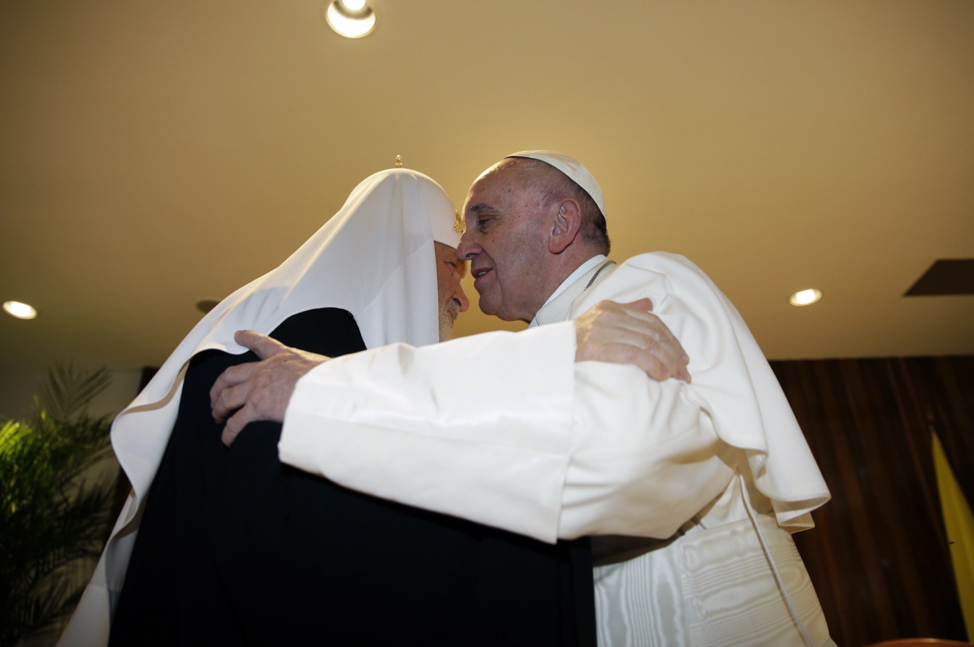 Patriarch Kirill and Pope Francis embrace at the José Martí airport in Havana, Cuba, February 12, 2016, exchanging the Kiss of Peace at their first-ever meeting